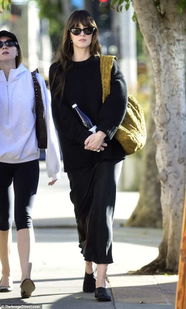 Dakota Johnson spends time with friends in LA after Chris Martin split rumors