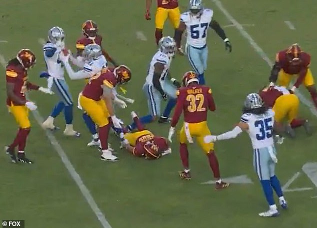 Austin Ekeler lays motionless on the floor after brutal hit in wild ending to Commanders vs Cowboys