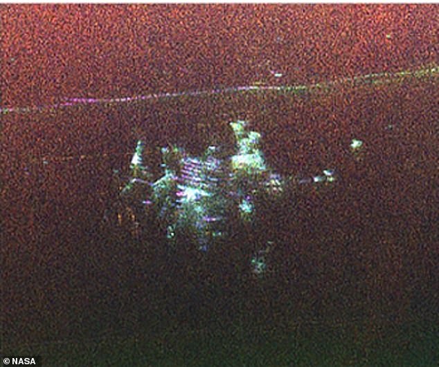 Secret Cold War nuclear base hidden under ice sheet is captured in stunning photo by pilot flying overhead