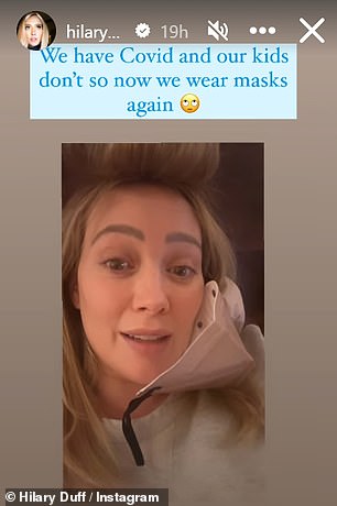 Pregnant Hilary Duff reveals she and husband Matthew Koma have COVID- 19 and are wearing masks to protect their young children