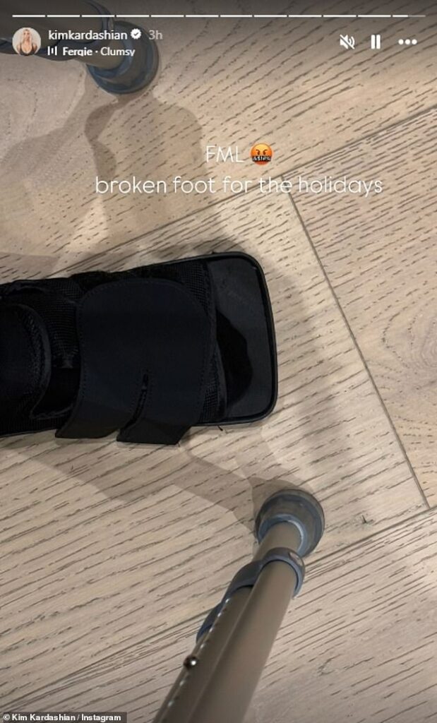 Kim Kardashian reveals she broke her foot as she shows off her cast and crutches while adding angry emoji