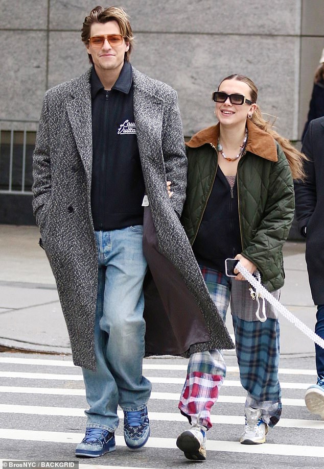 Millie Bobby Brown and Jake Bongiovi walk dog Winnie as they prepare for  first Christmas as a married couple