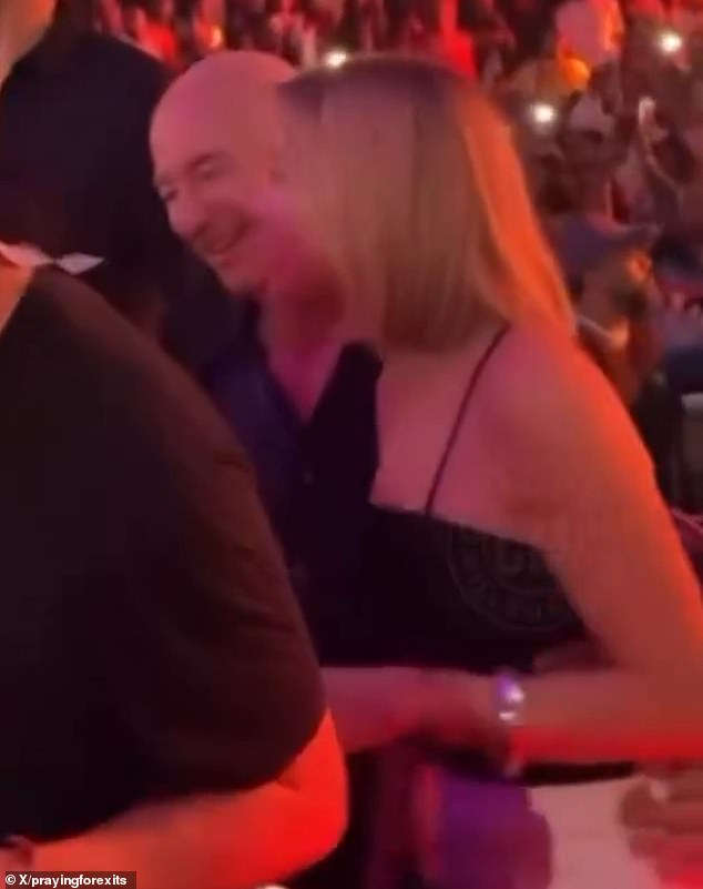 Video of Jeff Bezos wrapping his arm around Lauren Sanchez’s pal goes viral as ‘confused’ fans question relationship