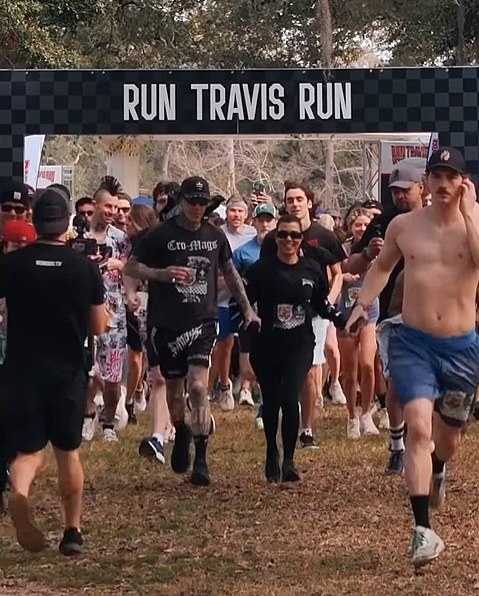 Kourtney Kardashian and Travis Barker hold hands while running 5K in New Orleans