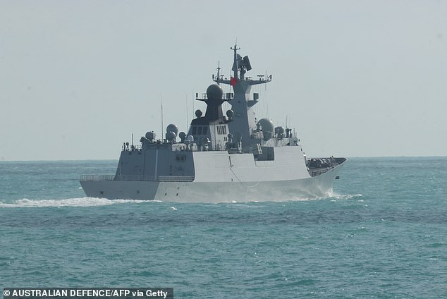 China flexes its military muscles as warships sail close to Australia in ‘unprecedented’ move of aggression while Beijing navy chopper buzzes within TEN FEET of Philippines coastguard plane