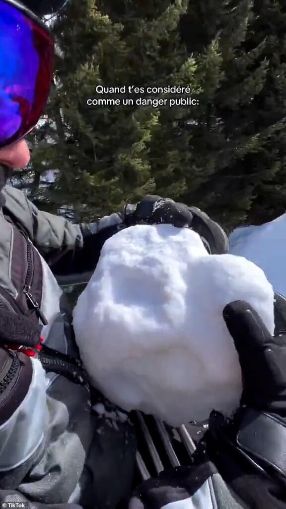 Shocking moment French skier hurls giant snowball from a chairlift injuring grandfather who was eating lunch below – as prankster faces jail