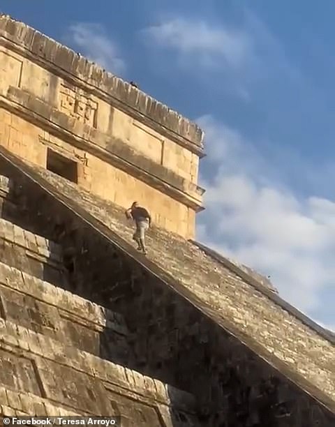 Moment German tourist is attacked by furious locals while being dragged away by security after climbing the steps of a Mayan temple in Mexico