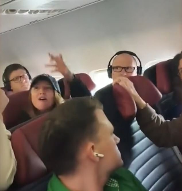Chaos erupts as a passenger is REMOVED from a Virgin Australia flight for a trivial reason that sparked a tense altercation with airline crew