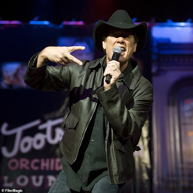 Country music legend rushed to hospital after suffering medical episode on stage