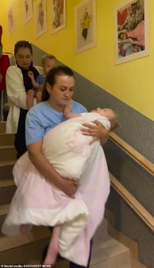 Putin’s cruellest attack: Heartbreaking moment terminally ill orphans have to be evacuated to bomb shelter as Russian drones target Ukraine