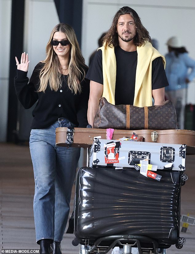 Here comes the bride! Glowing Delta Goodrem arrives home to Australia with her new husband Matthew Copley (and mountains of luggage) after their romantic Malta wedding