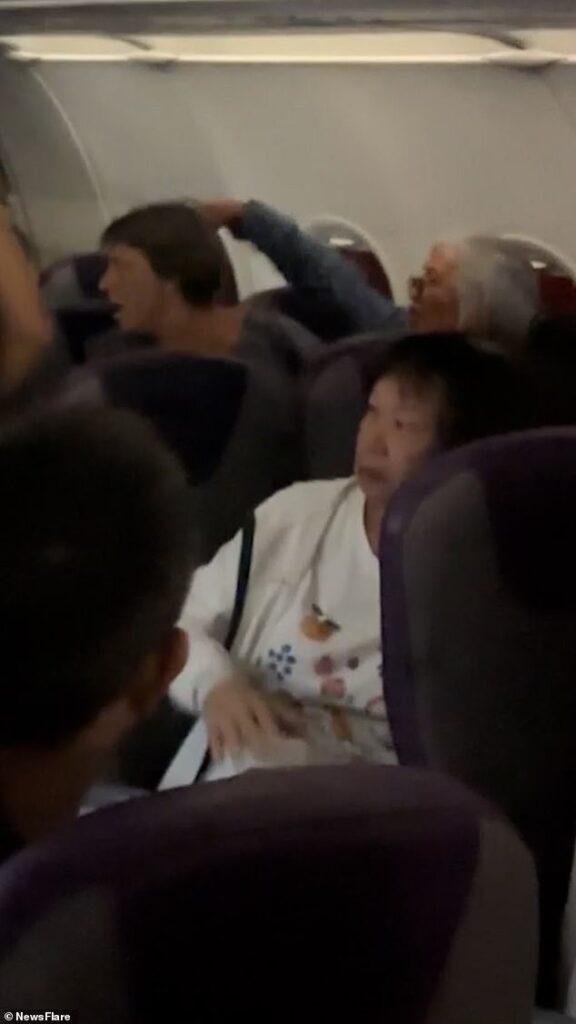 It’s all kicking off! Shocking moment Elderly woman screams foul-mouthed rant at parents after their toddler kicked the back of her seat, sparking mid-air row