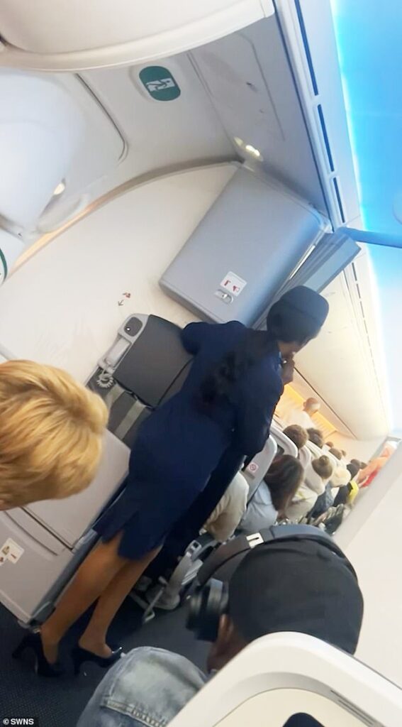 Scary moment plane passenger tries to open cabin doors at 30,000 feet – as screaming passengers feared they were about to die