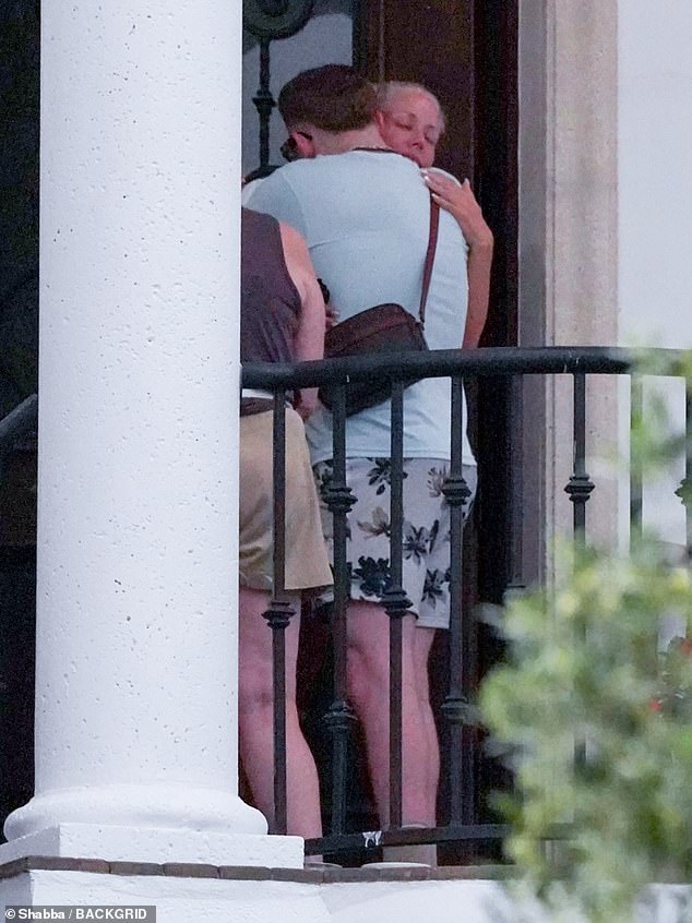 Hulk Hogan’s heartbroken widow tearfully embraces loved ones as she is seen for the first time since WWE icon’s fatal cardiac arrest