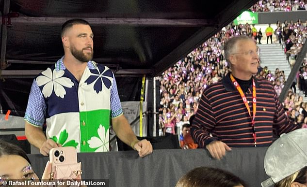 Taylor Swift KISSES Travis Kelce following sold-out concert in Argentina after changing lyrics to hit song to surprise the NFL star: ‘Karma is the guy on the Chiefs, coming straight home to me’