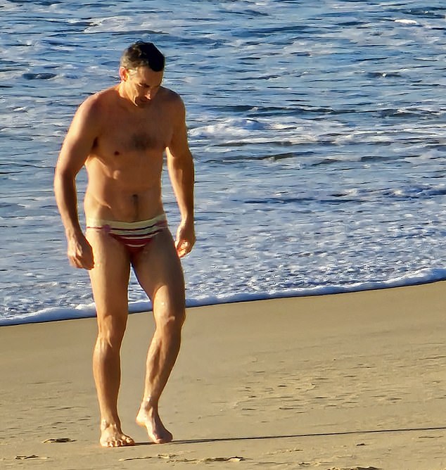 Footy legend Billy Slater looks fit enough to play as he takes a freezing dip at Queensland’s State of Origin camp