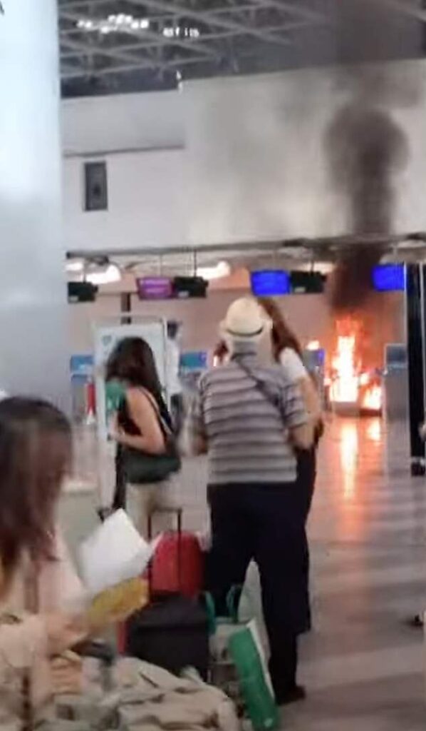 Tourists flee from Italian international airport as man ‘sets fire to check in desk’ during hammer rampage before being pinned down