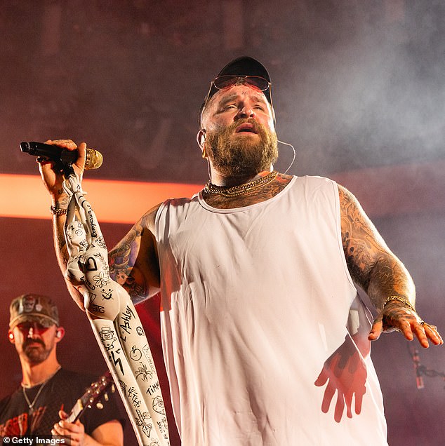 Revealed: The star who’ll be playing the NRL grand final – and he’s NOWHERE near as well known as the AFL’s Snoop Dogg