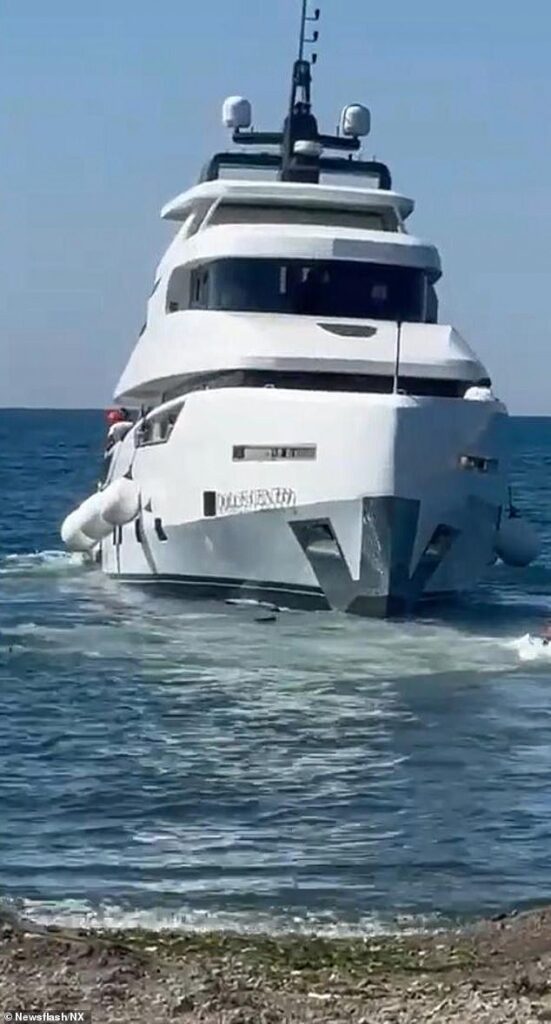 I’ve got that sinking feeling… Moment brand new luxury yacht sinks, just minutes after it is launched – as rich owner is forced to swim ashore