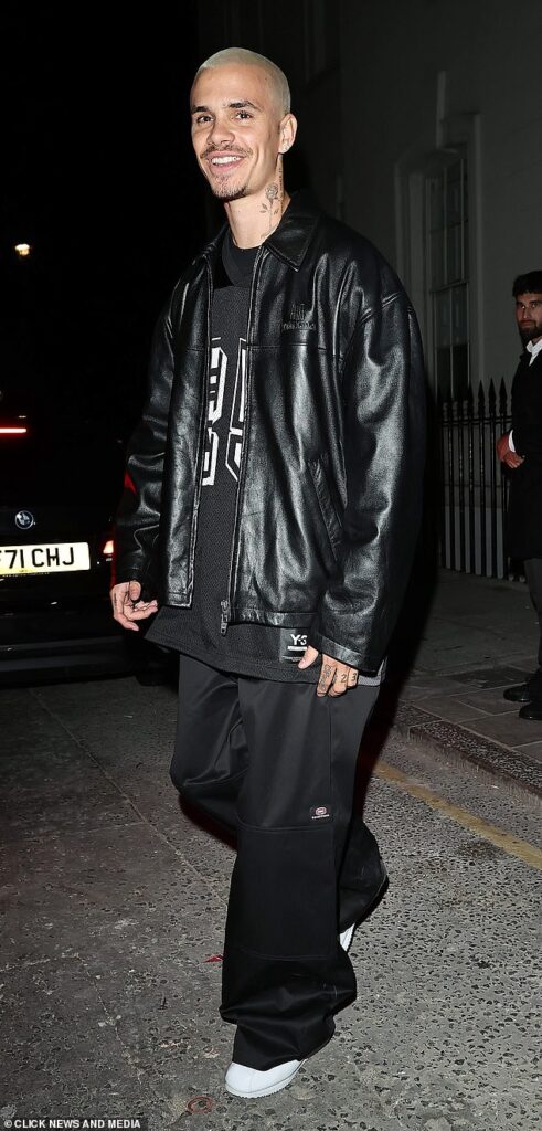 Romeo Beckham cuts a trendy figure in a black leather jacket as he rings in his 23rd birthday with family at lavish London venue – but there is once again no Brooklyn