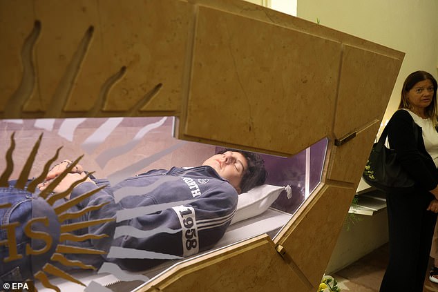 What happens next to the British-born millennial saint: Carlo Acutis will be displayed for the faithful, while cuttings of his hair are sent to chosen few as relics and his heart is stored in a gold box