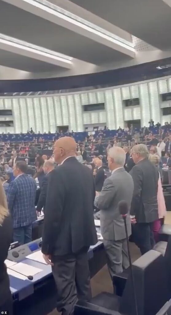 Shocking moment left-wing politicians refuse to take part in minute’s silence for Charlie Kirk in European Parliament – prompting screaming match with right-wing opponents