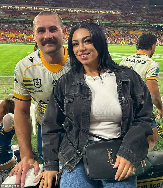 Footy star’s wife dumps his possessions on the front lawn in savage Facebook post after he was axed by his club