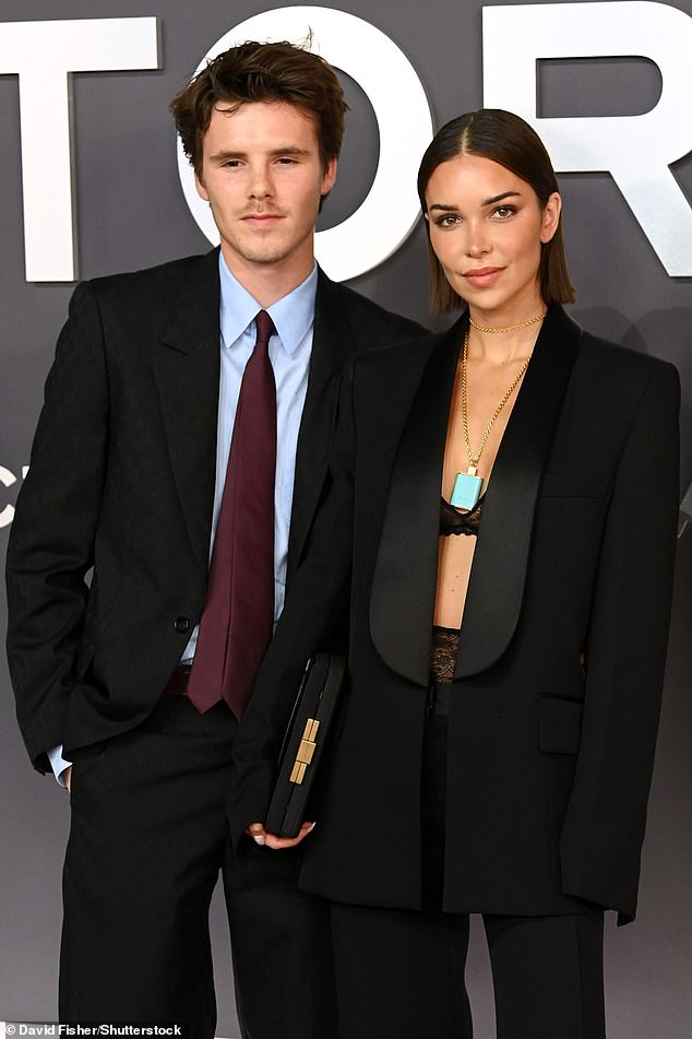 Jackie Apostel, 29, bares her cleavage in a skimpy black lace bra as she  steals the spotlight from boyfriend Cruz Beckham, 20, at his mother Victoria’s Netflix documentary launch
