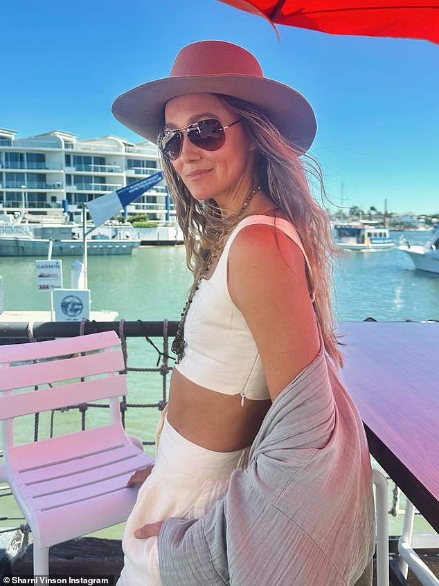 Home and Away star turns up the heat as she flaunts her pert derrière in tiny G-string bikini