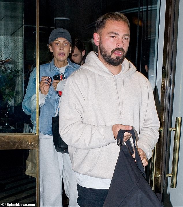 Olivia Attwood and husband Bradley Dack look puffy-eyed during rare outing before having tense exchange after admitting the ‘last six months have been really challenging for them’