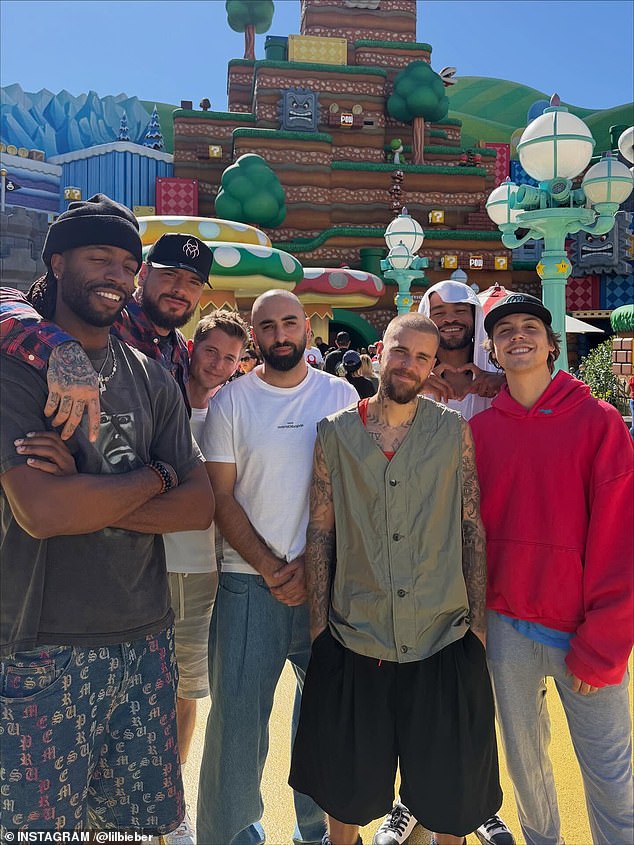 Justin Bieber enjoys theme park trip with his guy pals as ‘feud’ reignites between wife Hailey and ex Selena Gomez