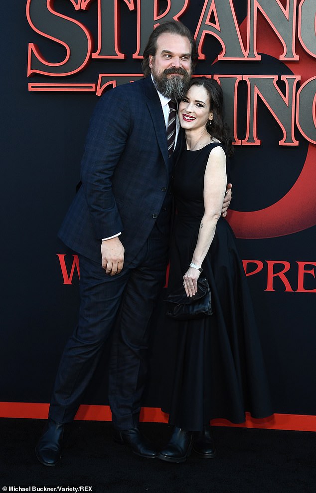 David Harbour says he ‘fell in love’ with ‘extraordinary creature’ Winona Ryder on the set of Stranger Things as it’s revealed she has been his shoulder to lean on after Lily Allen split